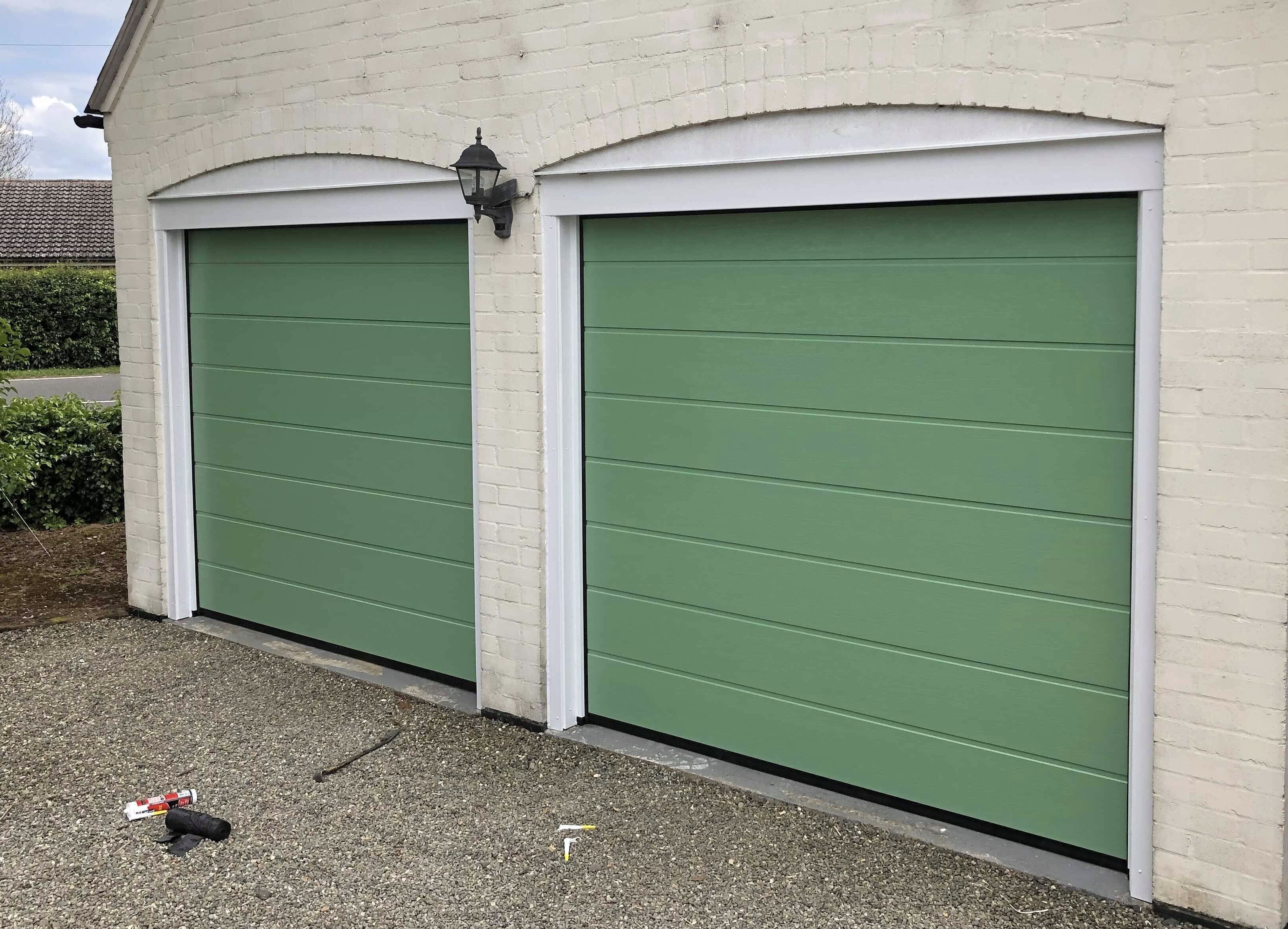 Two sectional garage doors in Chatwell Green RAL colour
